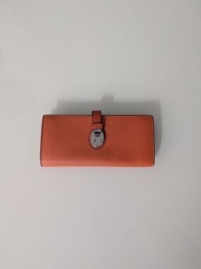 Tumi Leather Continental Wallet - Turn-Lock Closure